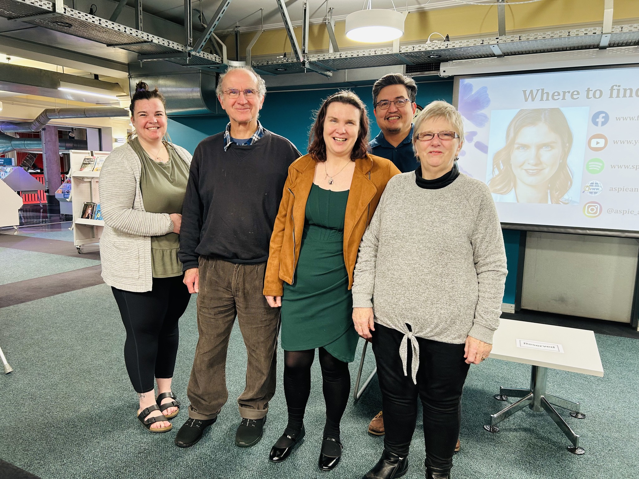 Kerrin with family and supporters after a 2024 book-reading event
